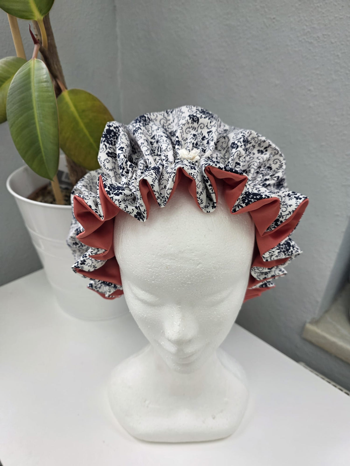 Bonnet Satin Ornamente blau aprico