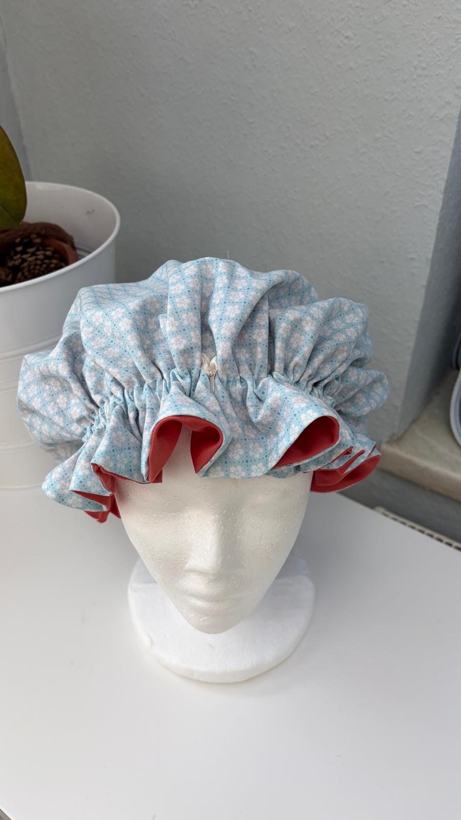 Bonnet Satin Blümchen blau aprico