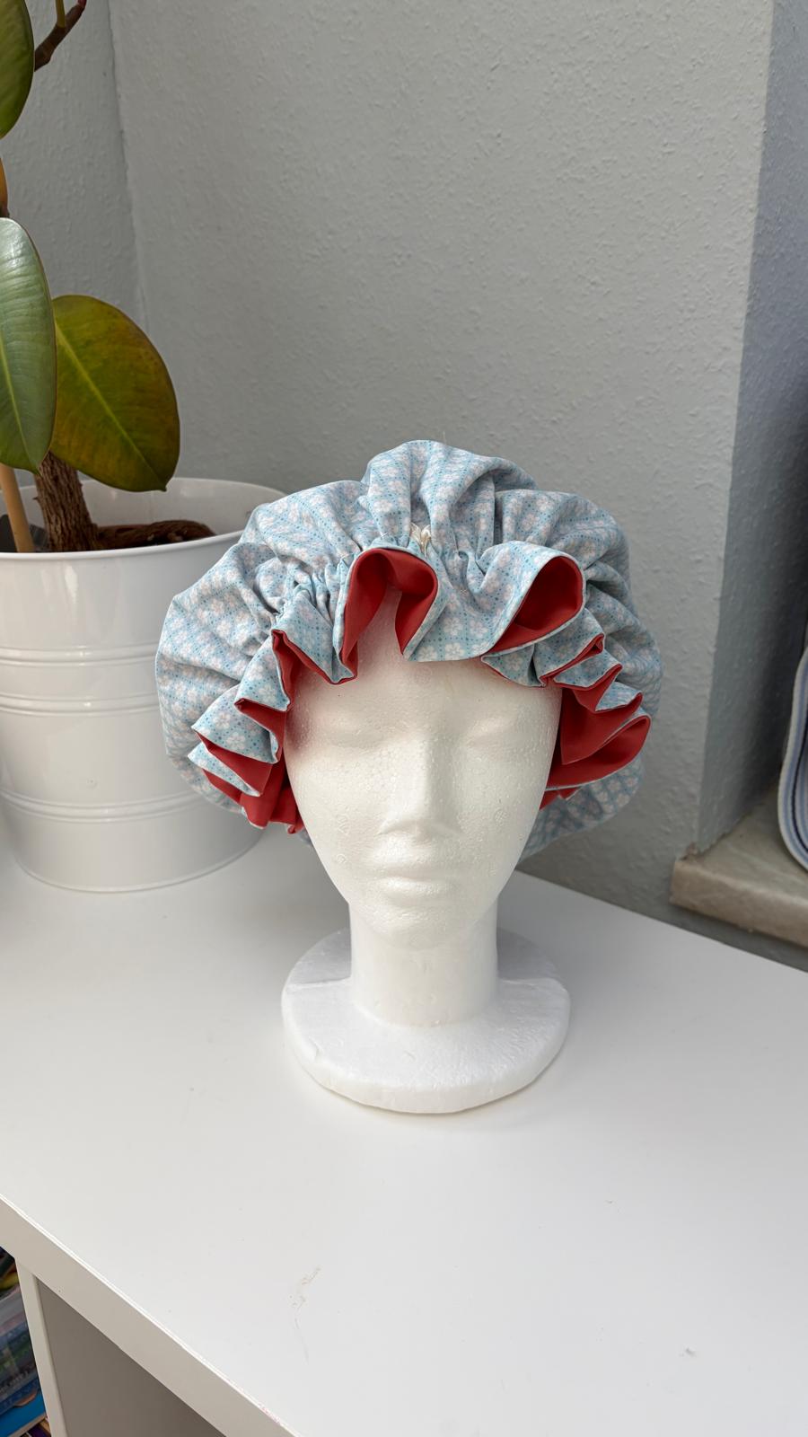 Bonnet Satin Blümchen blau aprico